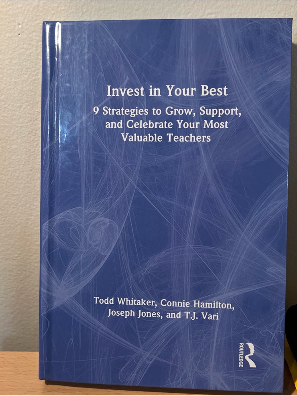 Invest in Your Best by Routledge — Blue Hardcover